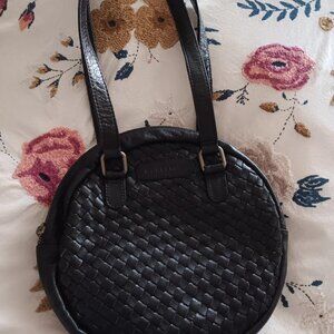 Wanderers Travel Co black leather bag